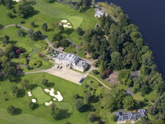 Oblique aerial view of Rossdhu House and policies, taken from the ENE.