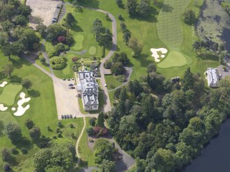 Oblique aerial view of Rossdhu House and policies, taken from the NNE.