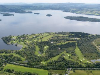 General oblique aerial view of Rossdhu House and Loch Lomond Golf Course, taken from the WNW.