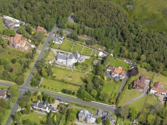 Oblique aerial view of Helensburgh, centred on the Hill House, taken from the S.