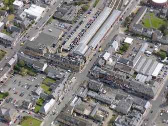 Oblique aerial view of Helensburgh Central Station and Council Offices, taken from the WSW.