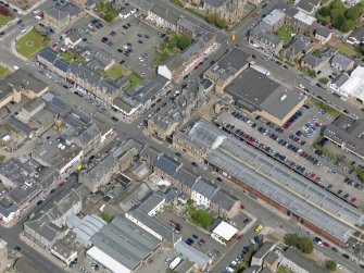 Oblique aerial view of Helensburgh Central Station and Council Offices, taken from the SSE.