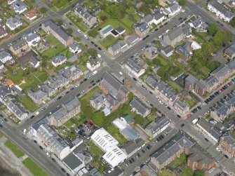 Oblique aerial view of Helensburgh, centred on St Michael's and All Saints Church, taken from the SE.