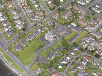 Oblique aerial view of Helensburgh, centred on Cairndhu House, taken from the SE.