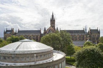 Elevated view looking across the roof of the reading room to the main university buildings, taken from the roof of the student refectory to the north