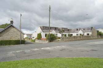 Street view of 136-142 Linlithgow Road, at the junction of Borrowstoun Road and Linlithgow Road, Bo'ness, taken from the South-East. This crossroads, and the cottages around it, originally formed the area of Borrowstoun, before the expansion Bo'ness. This photograph was taken as part of the Bo'ness Urban Survey to illustrate the character of the Borrowstoun Area of Townscape Character.