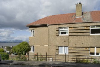 View of the flatted housing at 75-81 Stewart Avenue, taken from the South-West. The Firth of Forth can be seen in the background. This photograph was taken as part of the Bo'ness Urban Survey to illustrate the character of the School Brae Area of Townscape Character.