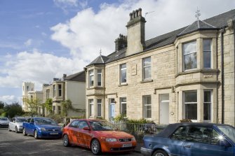 View of semi-detached housing at 87-89 Stewart Avenue, Bo'ness, taken from the South-East. This photograph was taken as part of the Bo'ness Urban Survey to illustrate the character of the School Brae Area of Townscape Character.