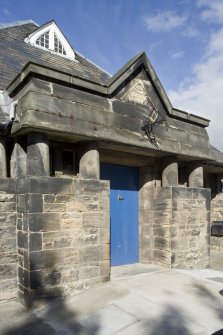 View of the entrance on the South (principal) elevation of the Masonic Lodge on Stewart Avenue, Bo'ness, taken from the South-West. This photograph was taken as part of the Bo'ness Urban Survey to illustrate the character of the School Brae Area of Townscape Character.