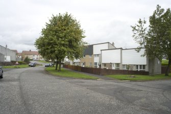 Street view looking towards terraced housing at 23-31 Muirepark Court, Bo'ness, taken from the South-East. This photograph was taken as part of the Bo'ness Urban Survey to illustrate the character of the Hillcrest and Brewlands Area of Townscape Character.