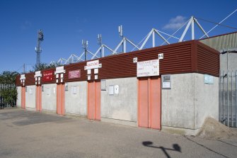 View of the visiting supporters' turnstiles in the South stand, taken from the south east.