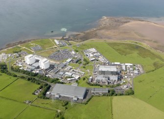 General oblique aerial view of Hunterston Nuclear Generating Station, taken from the SE.