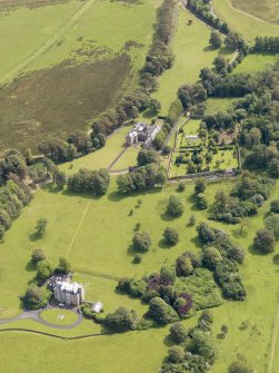 General oblique aerial view of Hunterston House and policies, taken from the NNW.