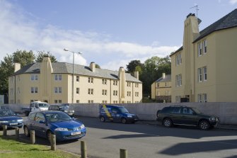 View of 20th century council housing, designed by Matthew Steele, at 43-51 Corbiehall, Bo'ness, taken from the North-West. This photograph was taken as part of the Bo'ness Urban Survey to illustrate the character of the Corbiehall and Snab Area of Townscape Character.