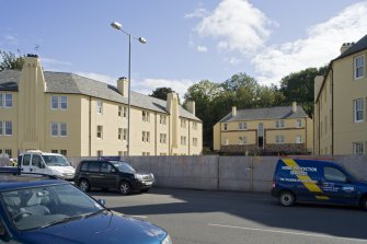 View of 20th century council housing, designed by Matthew Steele, at 43-51 Corbiehall, Bo'ness, taken from the North-West. This photograph was taken as part of the Bo'ness Urban Survey to illustrate the character of the Corbiehall and Snab Area of Townscape Character.