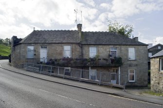 View of 8-14 Corbiehall, Bo'ness, taken from the North-East. This photograph was taken as part of the Bo'ness Urban Survey to illustrate the character of the Corbiehall and Snab Area of Townscape Character.