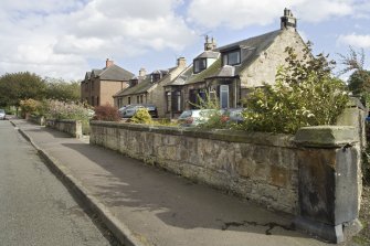 Street view showing 91-101 Deanfield Road, Bo'ness, taken from the West. This photograph was taken as part of the Bo'ness Urban Survey to illustrate the character of Deanfield Area of Townscape Character.