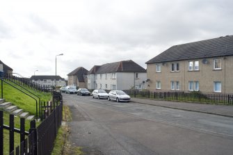 Street view looking West along the Northern side of Deanfield Terrace, Bo'ness. The housing on this street is a mixture of semi-detached and four-in-a-block. This photograph was taken as part of the Bo'ness Urban Survey to illustrate the character of Deanfield Area of Townscape Character.