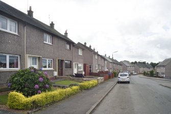 Street view showing the South side of Livingstone Drive (Nos 9-35), Bo'ness, taken from the North-East. This photograph was taken as part of the Bo'ness Urban Survey to illustrate the character of Deanfield Area of Townscape Character.