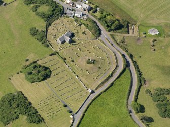 Oblique aerial view of Kirkmaiden Old Parish Church, taken from the NE.