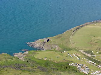 General oblique aerial view of Dunskey Castle, taken from the SE.