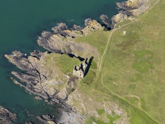 Oblique aerial view of Dunskey Castle, taken from the ESE.