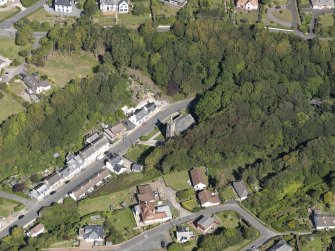 Oblique aerial view of Portpatrick Parish Church, taken from the SE.