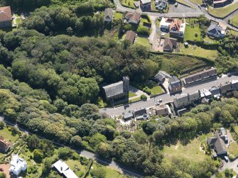 Oblique aerial view of Portpatrick Parish Church, taken from the NW.