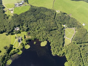 General oblique aerial view of Lochnaw Castle and policies, taken from the NE.