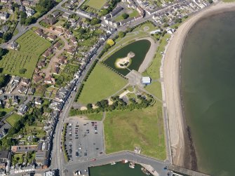 Oblique aerial view of Stranraer, centred on Agnew Park, taken from the E.