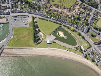 Oblique aerial view of Stranraer, centred on Agnew Park, taken from the N.