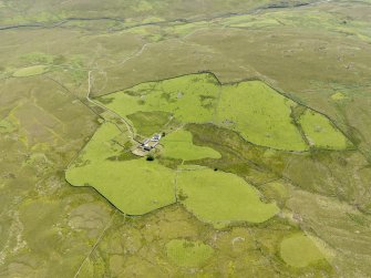 Oblique aerial view of Craigbirnoch farmstead and field system, taken from the WNW.