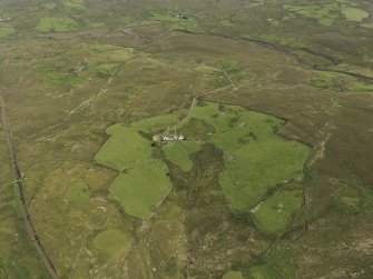 Oblique aerial view of Craigbirnoch farmstead and field system, taken from the SW.