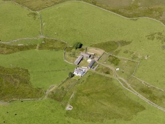 Oblique aerial view of Craigbirnoch farmstead and field system, taken from the ESE.