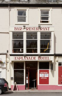 Detail of entrance and box bay windows above at Esplande Hotel, 2, 4 and 6 High Street, Rothesay, Bute