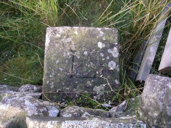 Gutterford: boundary stone in wall leading to Cock Rig summit (c NT 155 595)