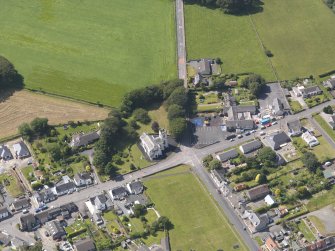 Oblique aerial view of Kirkcowan Parish Church, taken from the E.