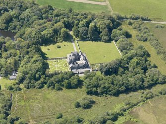 Oblique aerial view of Old Place of Mochrum, taken from the E.