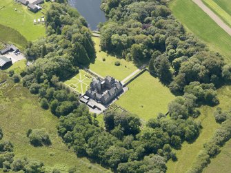 Oblique aerial view of Old Place of Mochrum, taken from the NE.