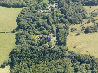 General oblique aerial view of Ravenstone Castle and policies, taken from the NNW.