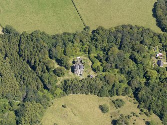 General oblique aerial view of Ravenstone Castle and policies, taken from the WSW.