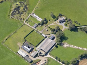 Oblique aerial view of Baldoon Mains, taken from the ESE.
