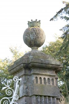 Detail of ball finial with crown on south gate pillar.
