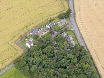 Oblique aerial view of Kingscavil Cottages, taken from the SE.