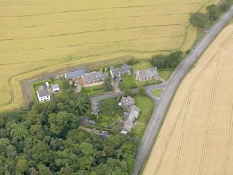 Oblique aerial view of Kingscavil Cottages, taken from the E.