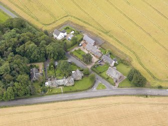 Oblique aerial view of Kingscavil Cottages, taken from the NNE.