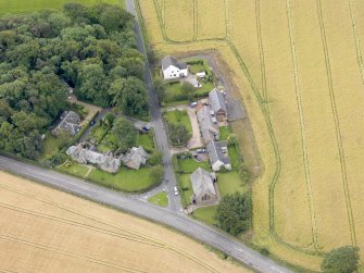 Oblique aerial view of Kingscavil Cottages, taken from the N.