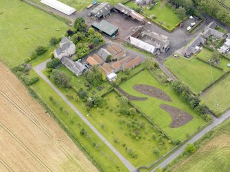 Oblique aerial view of Ochiltree Castle, taken from the NW.