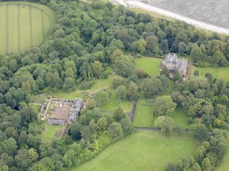 Oblique aerial view of Carriden House and stables, taken from the SSW.