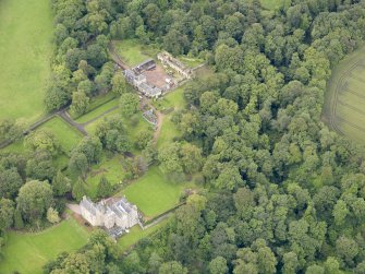 Oblique aerial view of Carriden House and stables, taken from the NE.